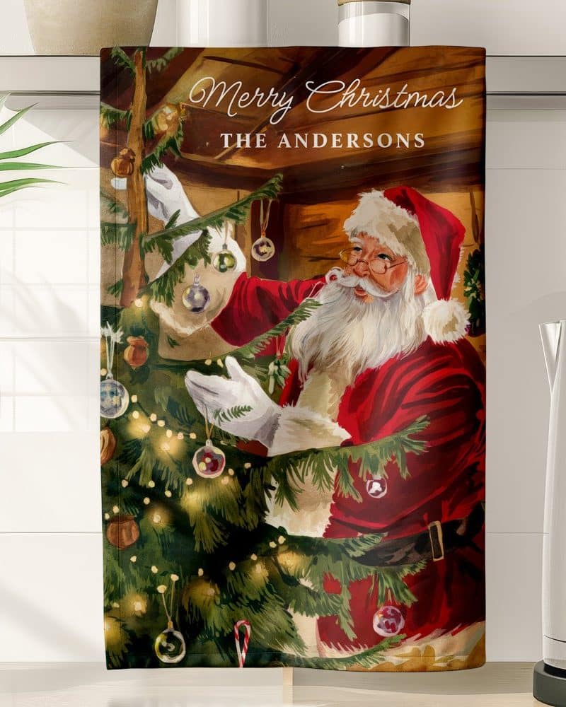 Santa Claus decorating a Christmas tree.