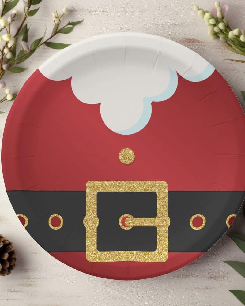 Paper plate decorated as Santa's suit.