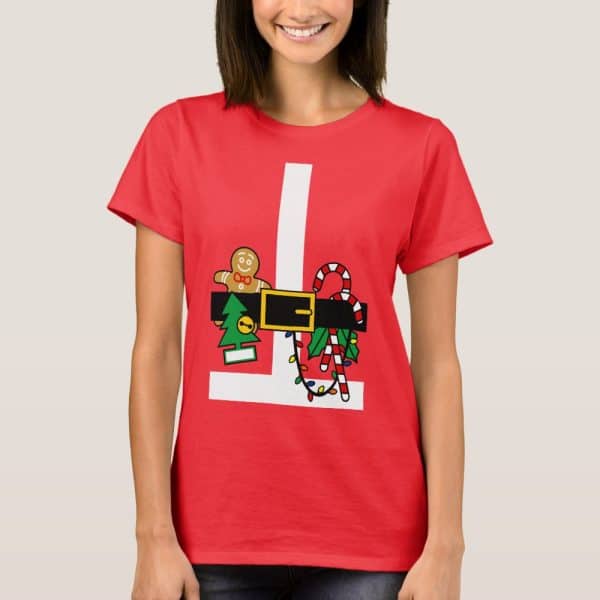 Woman Wearing A Red T-Shirt With A Graphic Of Santas Belt And Various Christmas Treats.