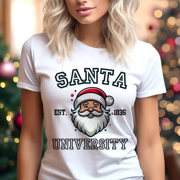 White T-Shirt Featuring A Santa Claus Graphic With Santa University Text.