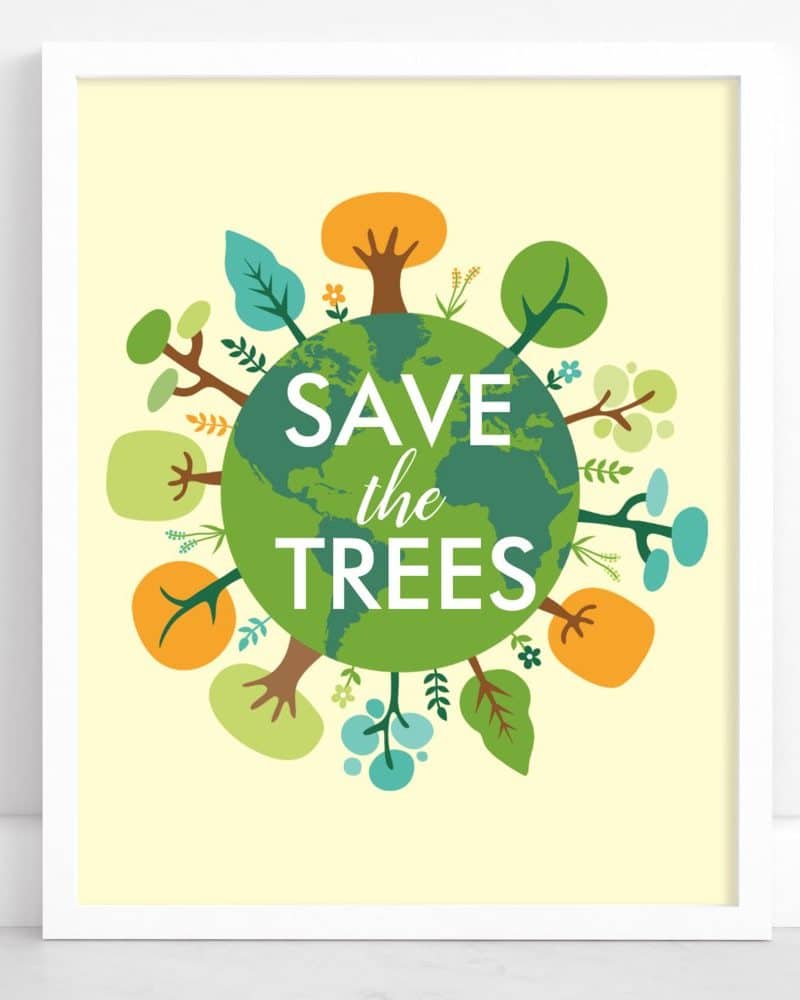 A framed poster with a green Earth encircled by stylized trees and the words Save the Trees.