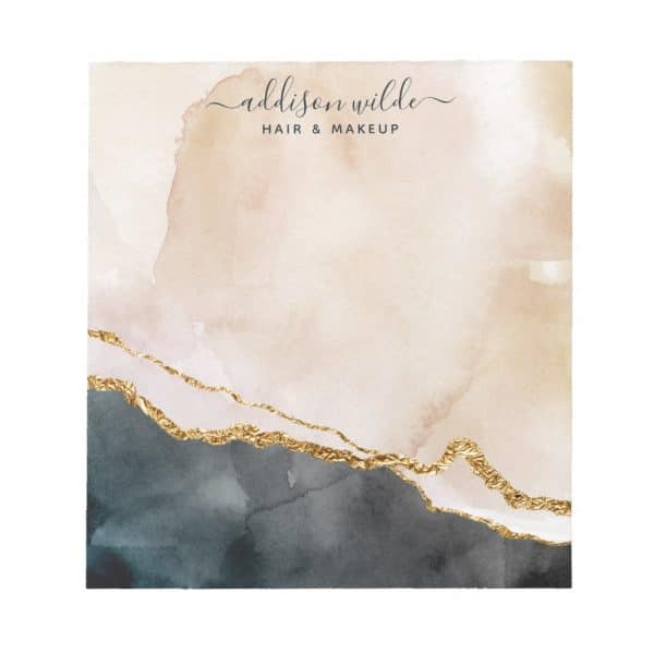 Addison Wilde Hair And Makeup Logo With A Watercolor Design Featuring Beige And Gray Tones Accented With Gold Foil.