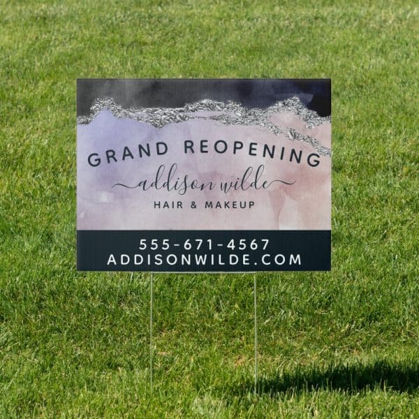 A Grand Reopening Announcement For Addison Wilde Hair &Amp; Makeup, Displayed On A Yard Sign With A Watercolor Design And Silver Accents.