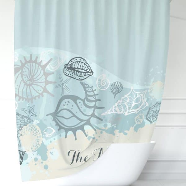 A Light Blue Shower Curtain Featuring A Seashell Design.
