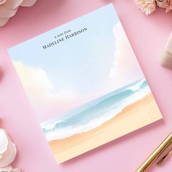 Personalized Notepad Featuring A Pastel Beach Scene With Ocean Waves And Sand.
