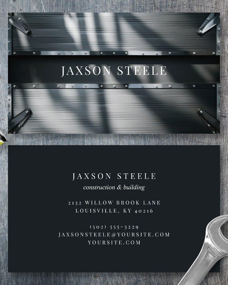 Jaxson Steele construction and building business card with a metallic gray background.