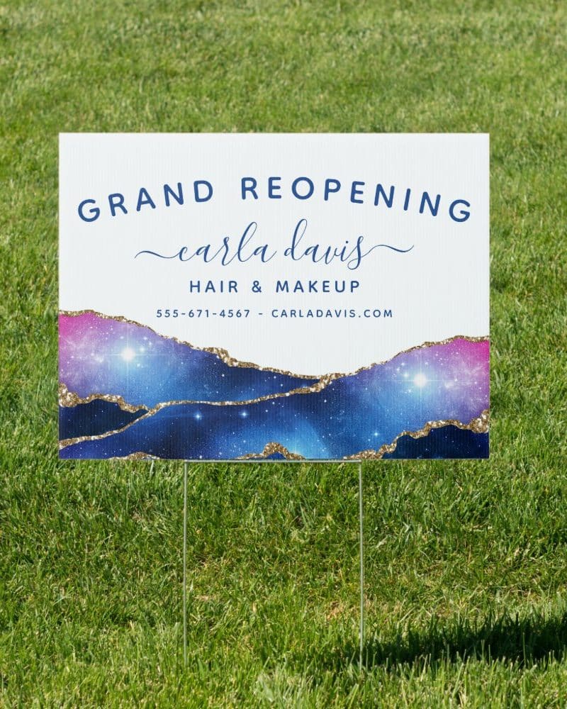 Grand reopening announcement for Carla Davis Hair & Makeup, featuring a galaxy design.