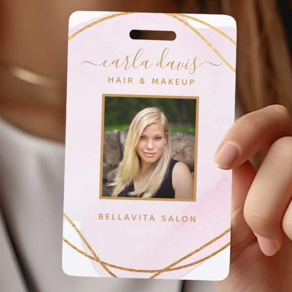 Pink And Gold Employee Id Card For Carla Davis, Hair And Makeup Artist At Bellavita Salon. A Photo Of Carla Is Included.