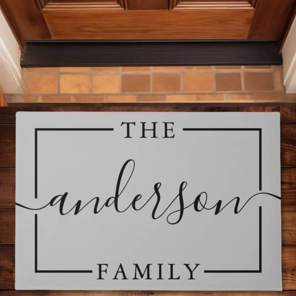 Gray Doormat With The Anderson Family In A Black Frame.