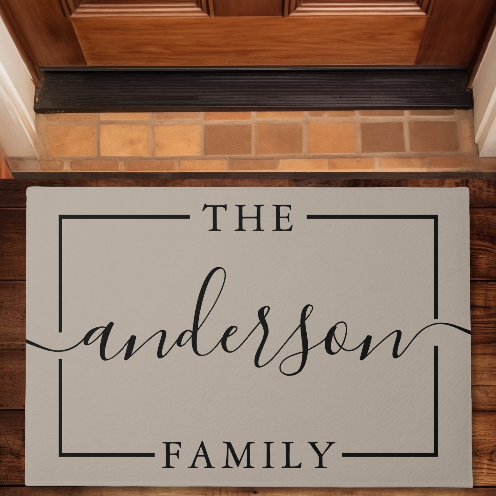 Tan Doormat With The Text The Anderson Family In A Simple Black Frame.