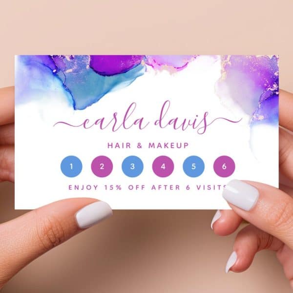 A Six-Visit Loyalty Card For Carla Davis Hair &Amp; Makeup, Featuring An Abstract Purple And Blue Watercolor Design.