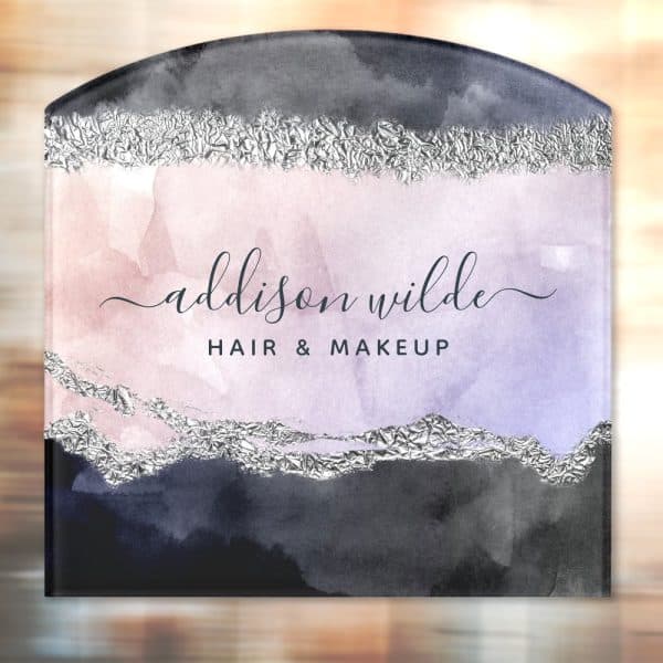 Arched Business Sign For Addison Wilde Hair &Amp; Makeup. The Sign Features A Watercolor Design In Shades Of Purple, Pink, And Gray, Accented With Silver Foil.