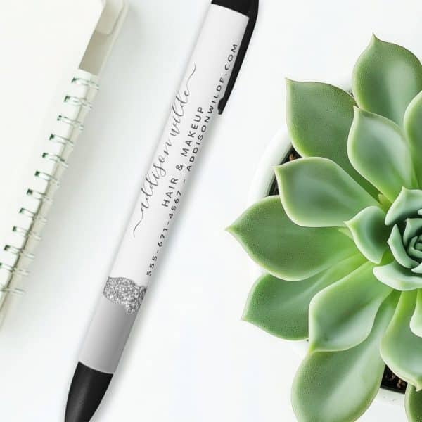 White Pen With Black Ink And Addison Wilde'S Hair And Makeup Business Information.