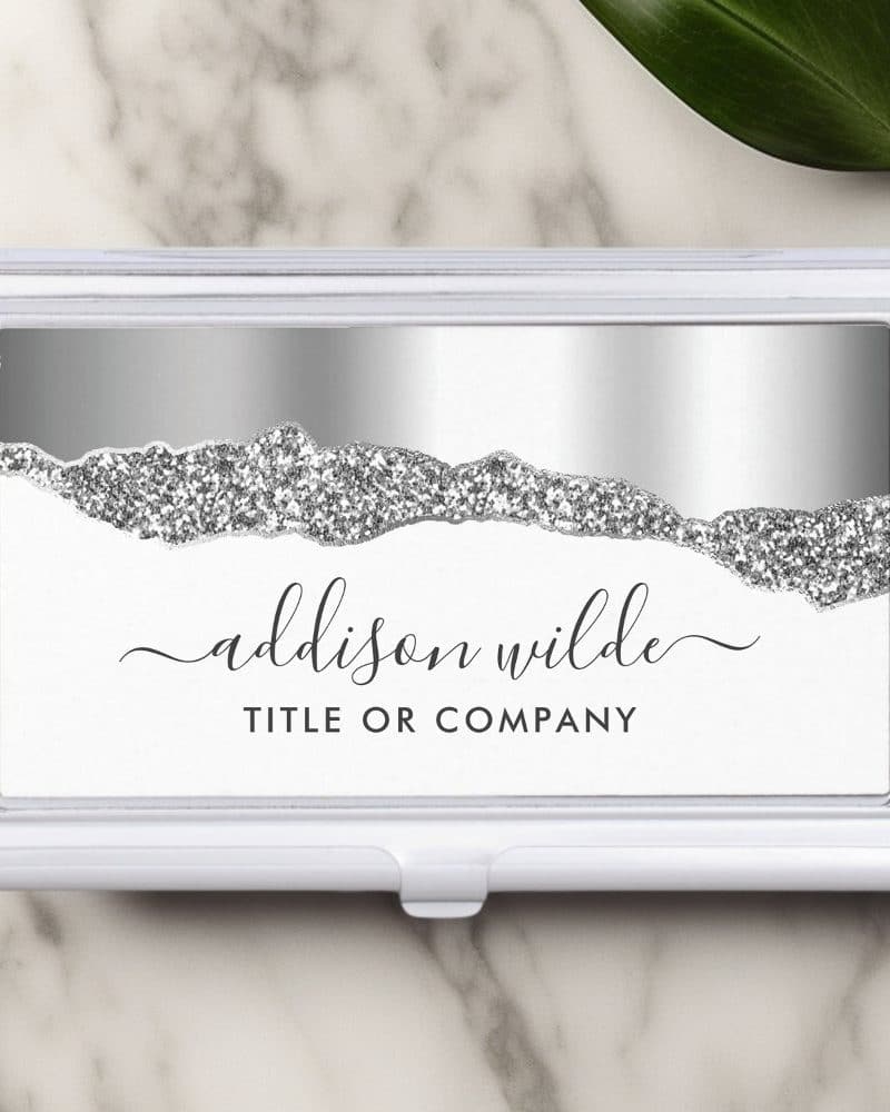 Silver glitter business card holder with the name Addison Wilde.
