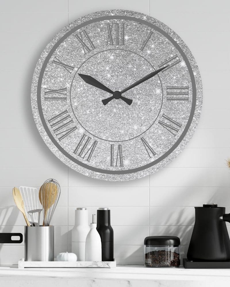Silver glitter clock with Roman numerals.