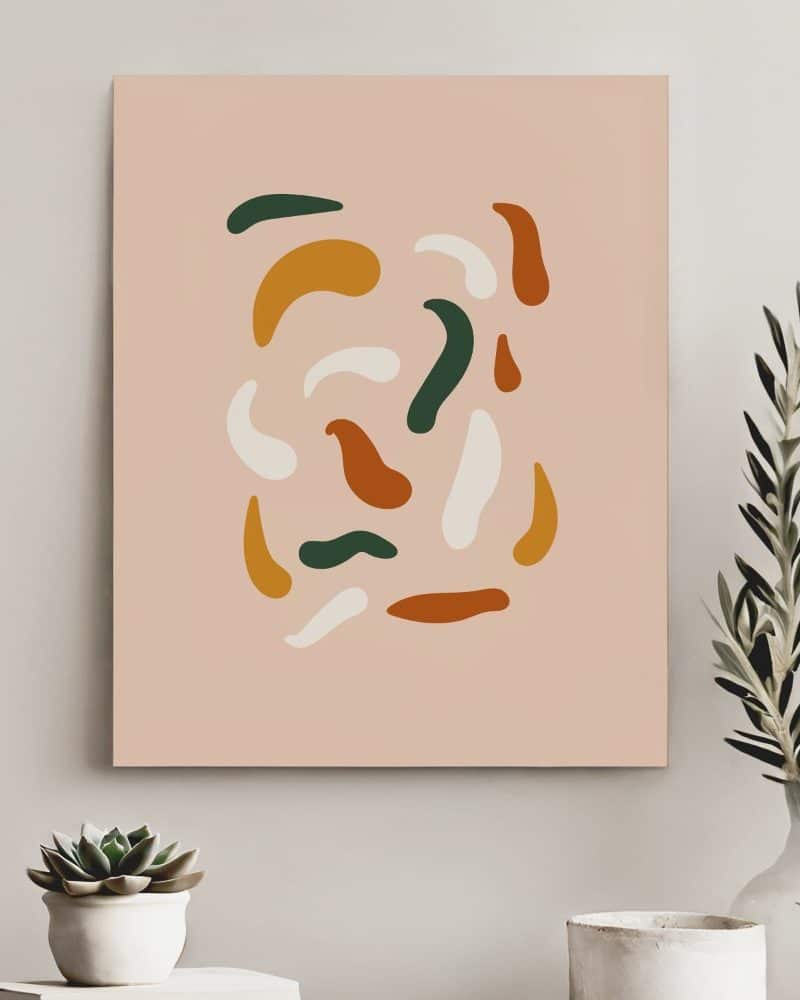 Abstract art print featuring a cluster of colorful, organic shapes on a pale pink background.