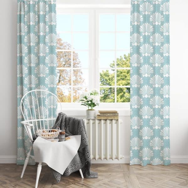 Light Blue Curtains With A White Seashell Pattern Hang In Front Of A Window.