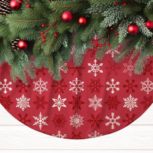Red Christmas Tree Skirt With A Snowflake Pattern, Adorned With A Fir Garland.