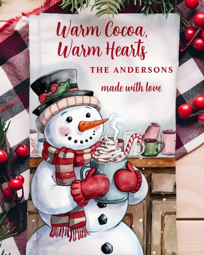 Watercolor painting of a snowman holding a mug of hot cocoa.