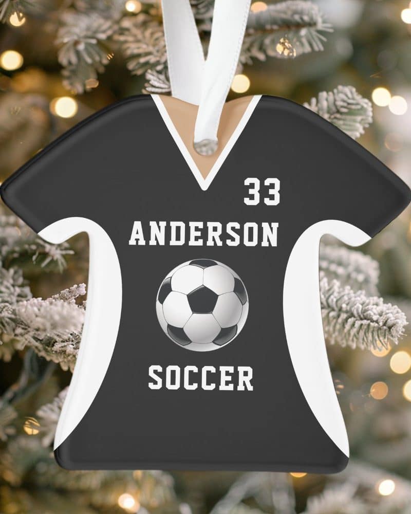 Black soccer jersey-shaped Christmas ornament with the name Anderson, number 33, and a soccer ball.