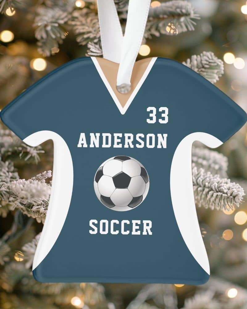 Blue soccer jersey ornament with the name Anderson and number 33, a soccer ball, and the word soccer.