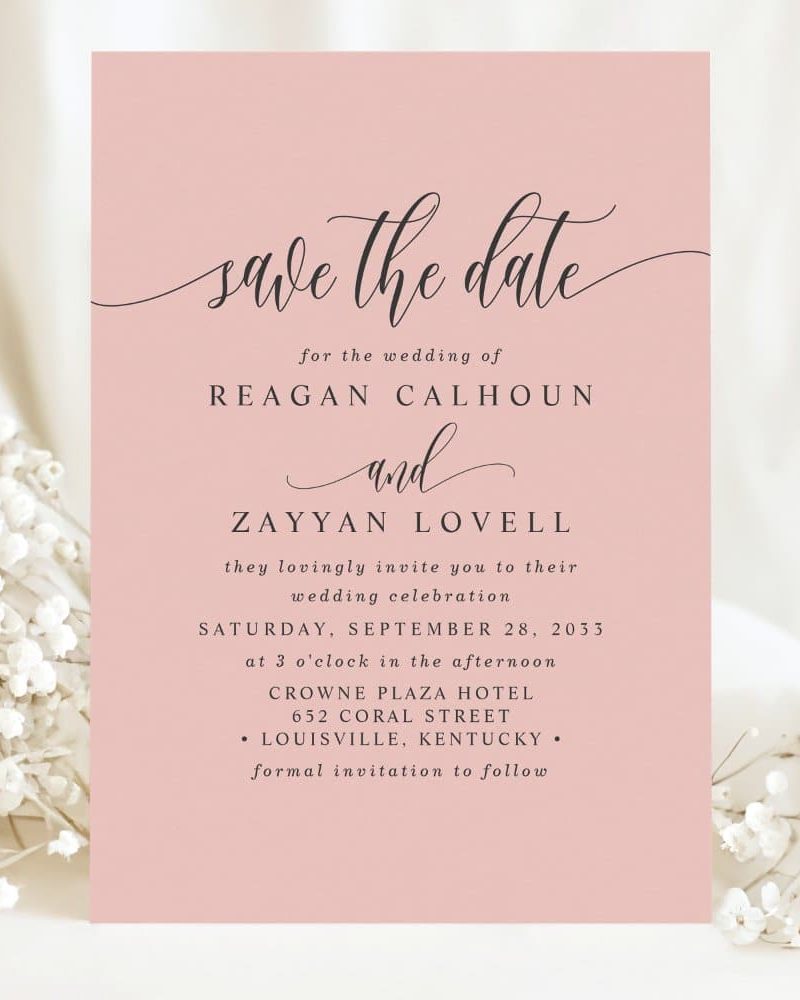 Pink save-the-date announcement for the wedding of Reagan Calhoun and Zayyan Lovell on September 28, 2033, at the Crowne Plaza Hotel in Louisville, Kentucky.