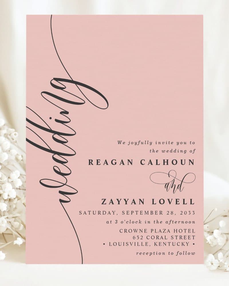 Pink wedding invitation for Reagan Calhoun and Zayyan Lovell, September 28, 2033, at the Crowne Plaza Hotel in Louisville, Kentucky.