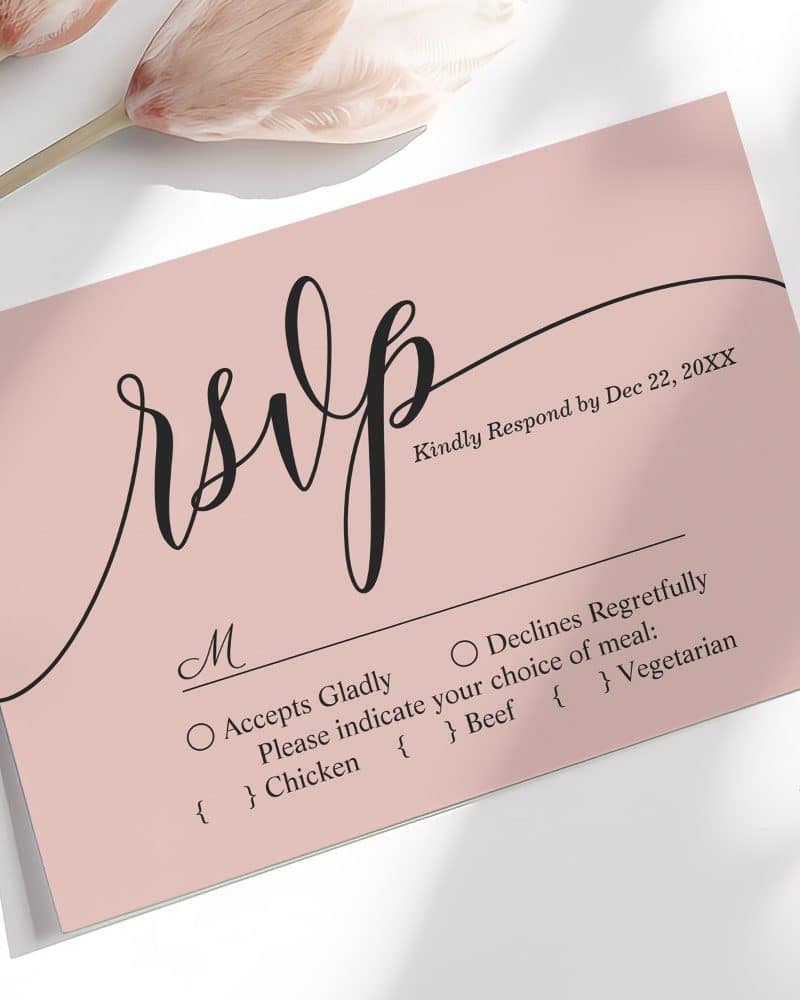 Pink RSVP card with black script lettering.