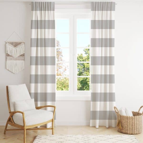 Gray And White Striped Curtains Hang On A Window.