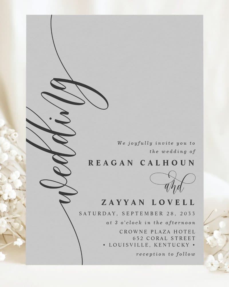 Wedding invitation for Reagan Calhoun and Zayyan Lovell, September 28, 2033, at the Crowne Plaza Hotel in Louisville, Kentucky.