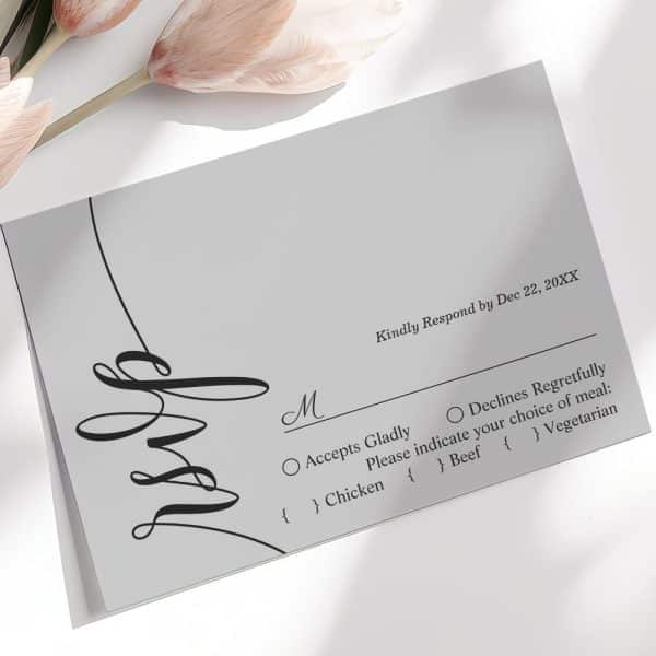 A Gray Wedding Rsvp Card With A Black Script Design And Meal Options.
