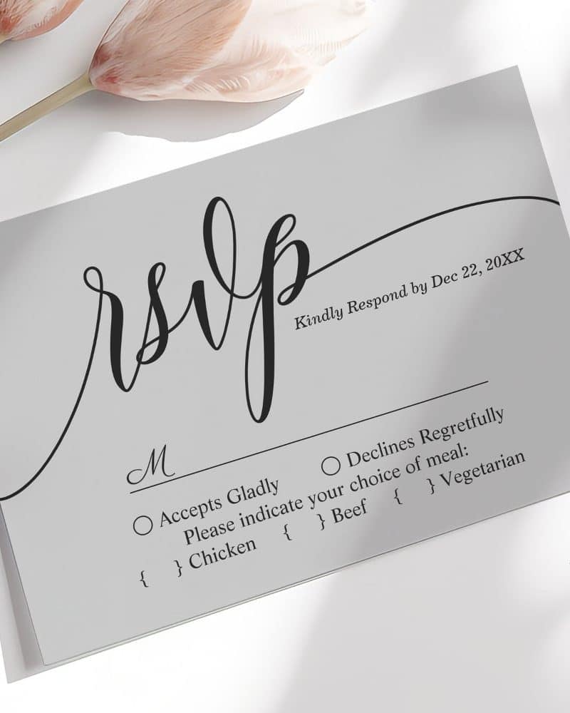 Gray RSVP card with elegant script lettering, offering meal choices and a response deadline.