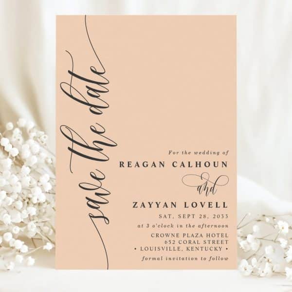 Peach-Colored Save-The-Date Card Announcing The Wedding Of Reagan Calhoun And Zayyan Lovell.