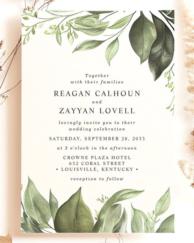 Wedding invitation for Reagan Calhoun and Zayyan Lovell, featuring a leafy botanical design.