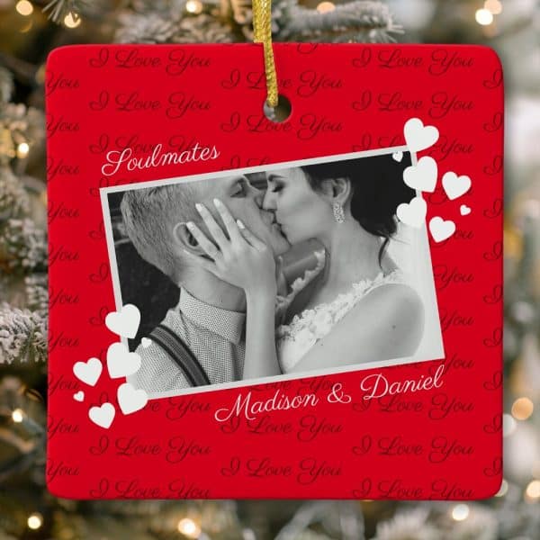 Red Christmas Ornament Featuring A Black And White Photo Of A Kissing Couple, Names Madison &Amp; Daniel, And The Word Soulmates. White Hearts Decorate The Ornament.