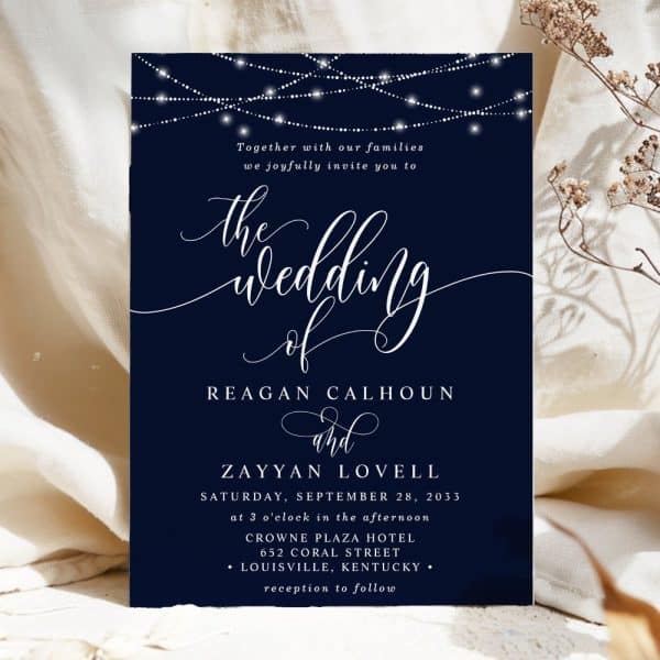 Wedding Invitation For Reagan Calhoun And Zayyan Lovell, Featuring String Lights And Elegant Script.
