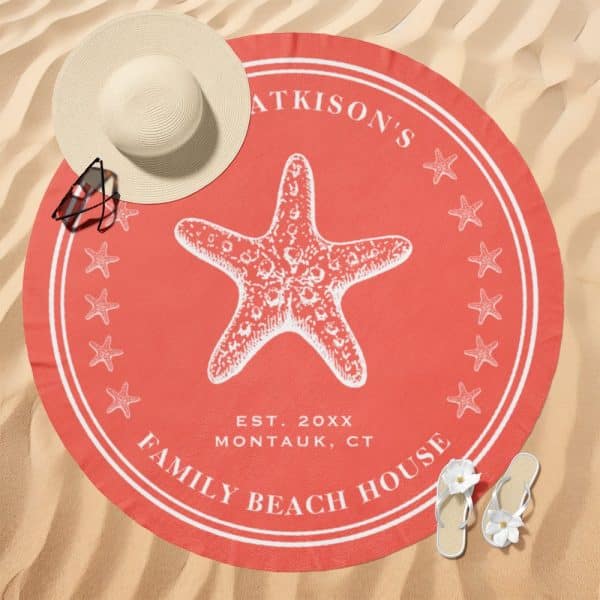 Coral Round Beach Towel With A Starfish Design, Family Name, And Location.
