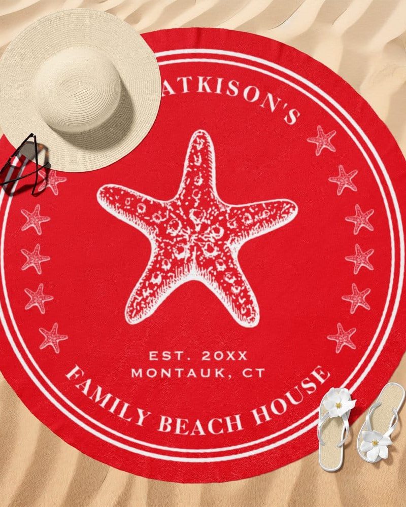 Red round beach towel with a white starfish and family name.