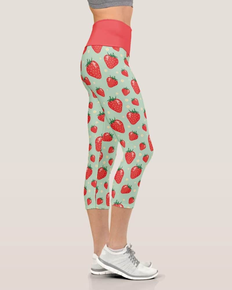 Cropped leggings with a strawberry pattern.