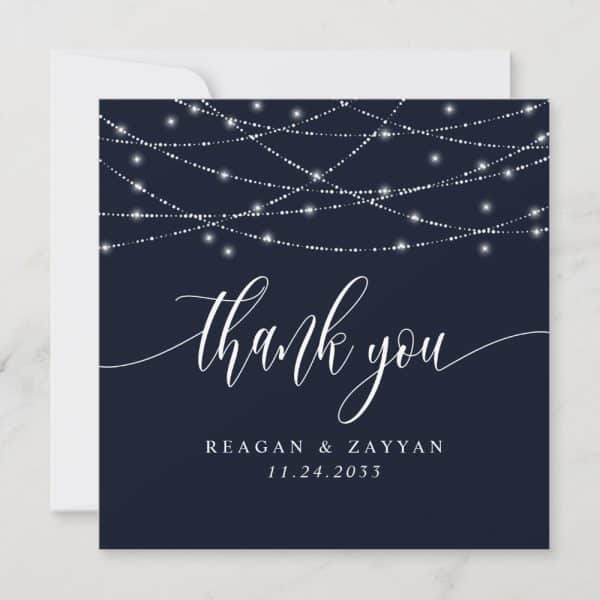 Dark Blue Thank You Card With White String Lights And Script.
