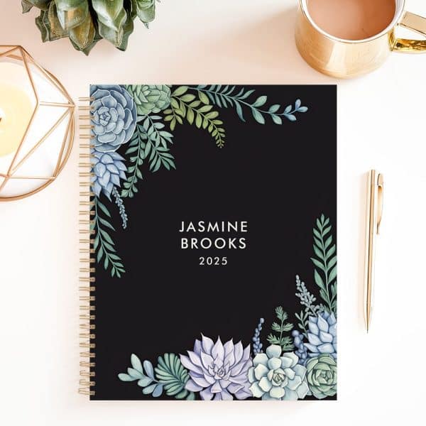 Black 2025 Planner With A Watercolor Succulent Design.