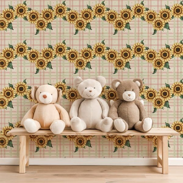Three Teddy Bears Sit On A Wooden Bench In Front Of A Wall Featuring A Repeating Pattern Of Sunflowers On A Pale Pink And Green Plaid Background.