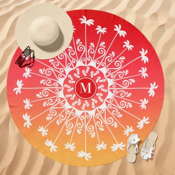 Round Beach Towel With An Ombre Design Of Red And Orange, Featuring A Central Mandala Pattern With Palm Trees And Flip-Flops, And A Monogram In The Middle.