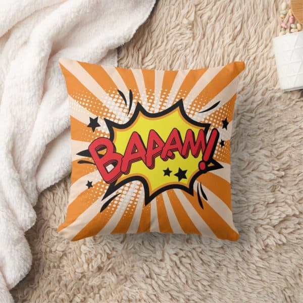 Orange Throw Pillow With A Comic Book Style &Quot;Baaaam!&Quot; Graphic.