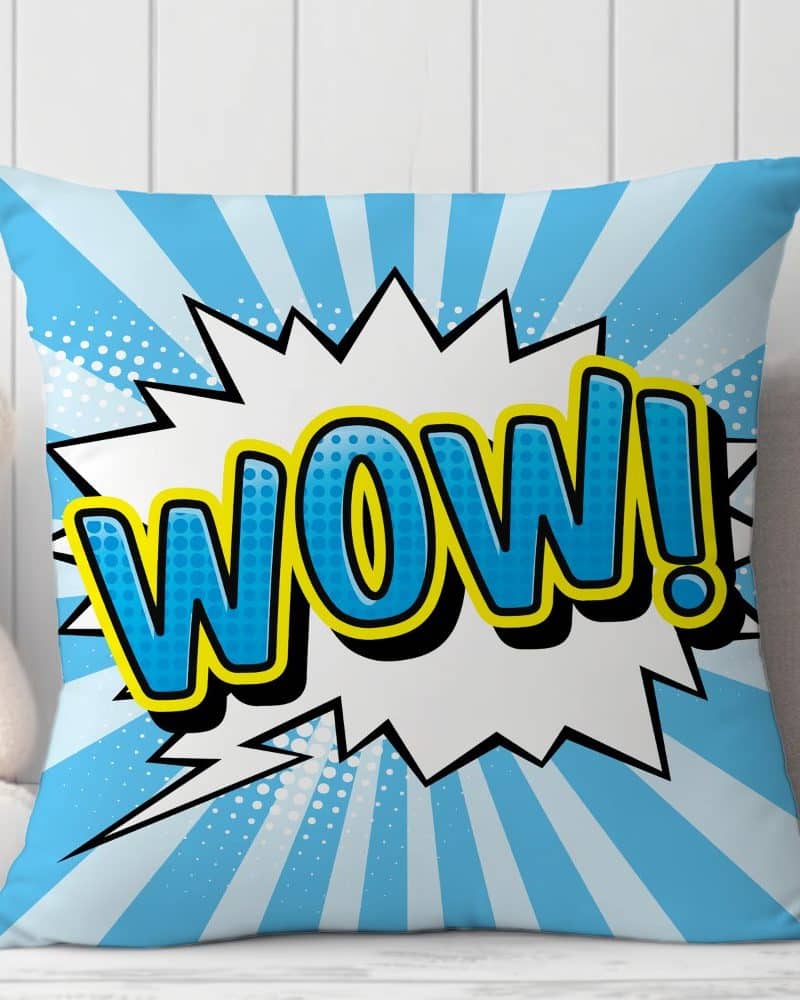 Blue square pillow with a comic book style WOW! in the center.