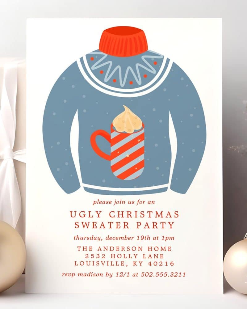 An invitation to an Ugly Christmas Sweater Party featuring an illustration of a blue sweater with a mug of hot chocolate on it.