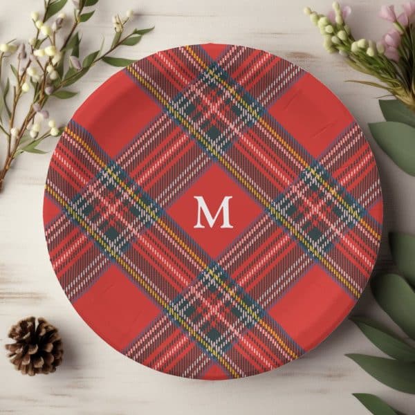 Red And Green Plaid Patterned Plate With The Letter M In The Center.