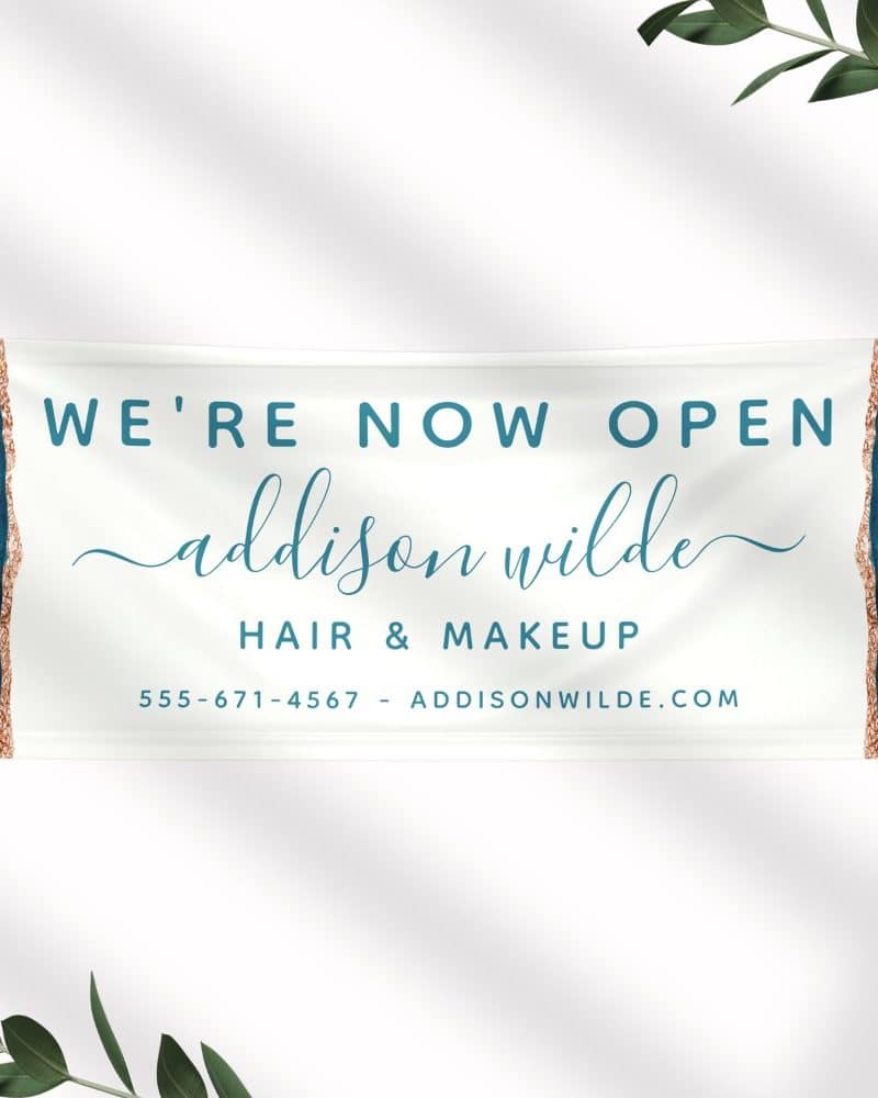 Grand opening banner for Addison Wilde Hair & Makeup. The banner features teal and gold design elements.
