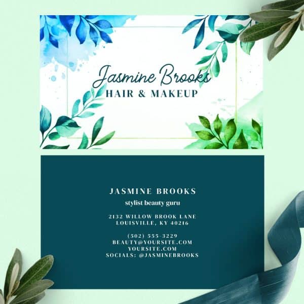 Business Card For Jasmine Brooks, Hair And Makeup Stylist, Featuring Watercolor-Style Green And Blue Leaves.