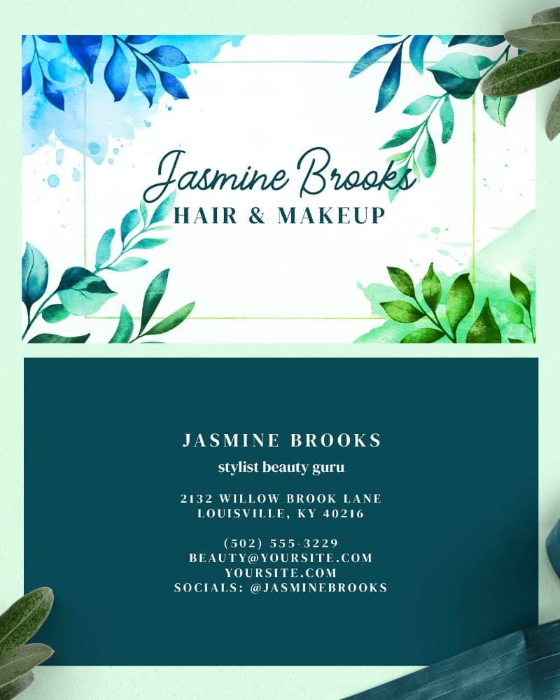 Business card for Jasmine Brooks, hair and makeup stylist, featuring watercolor-style green and blue leaves.